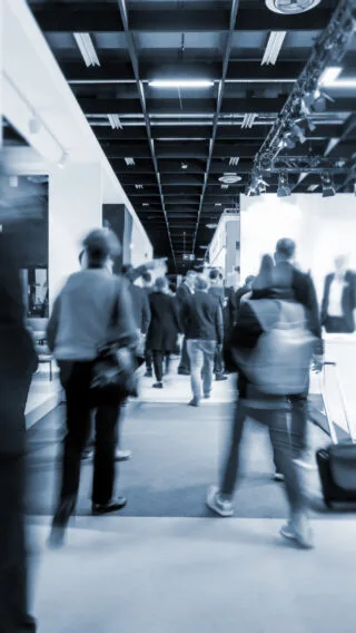 Blurred People at Trade Fair Adobe Stock 254779674